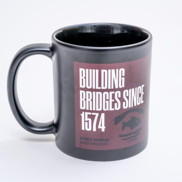 Con O'Neill mug with building bridges logo Irish gift for sale by Journey East bus and walking tours in Belfast Northern Ireland - photo 1234